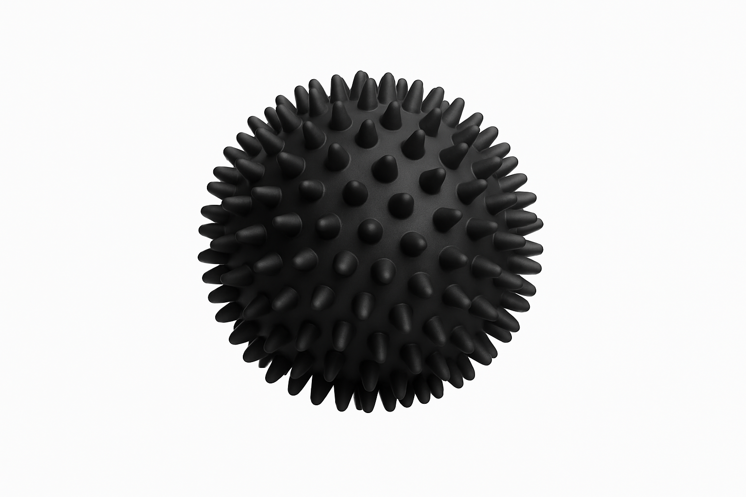 Balle de massage noire à picots avec arrière-plan neutre